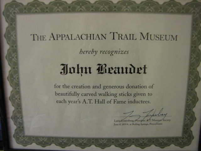 Certificate honoring John's contributions.